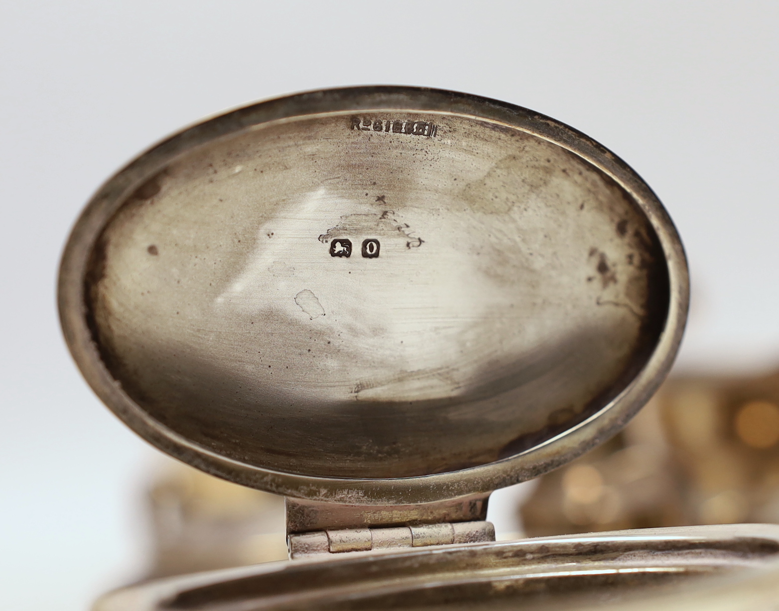 A small selection of silver items to include two sauceboats, a pair of cauldron salts, a further pair of lidded cauldron salts, together with a pair of pots and an inkwell.